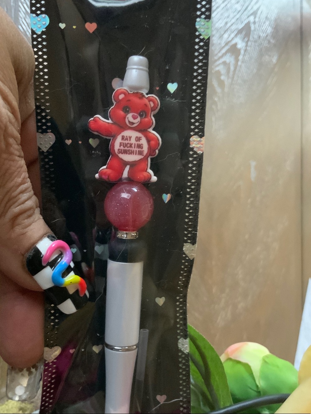 RED& WHITE INK PEN W/CARE BEAR & ACCENTED W/ MATCHING COLOR BEAD: ADULT LANGUAGE